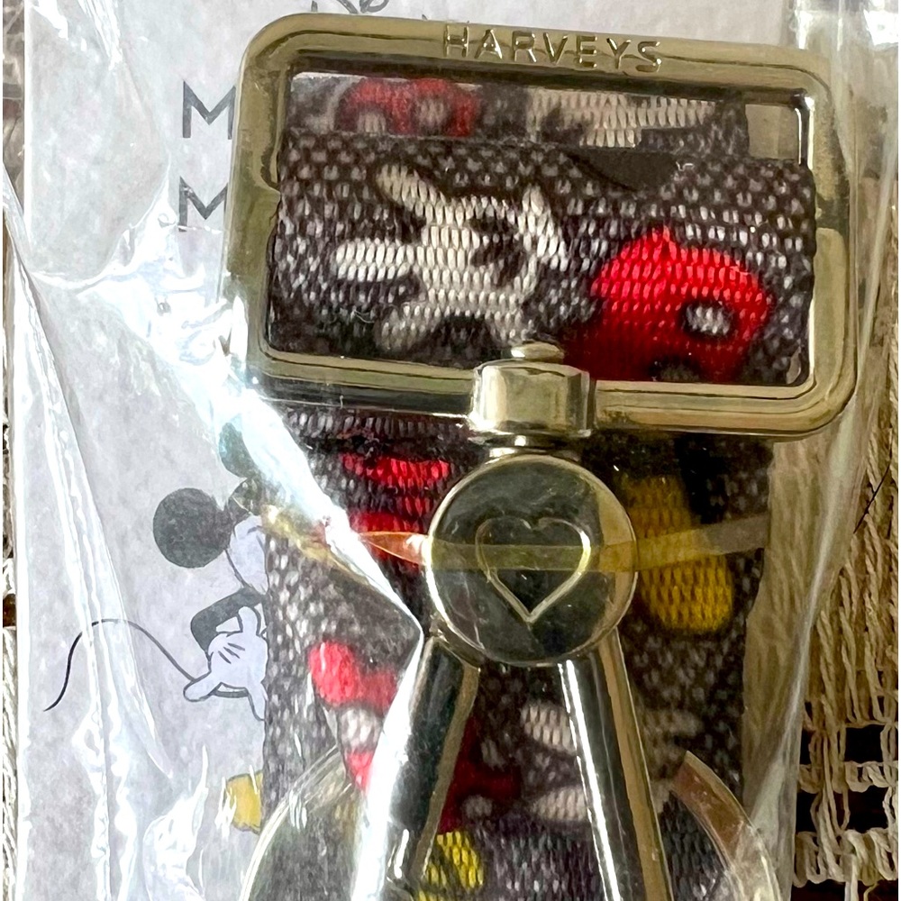 Harvey’s seat belt bag. I love you Mickey Mouse keychain in original packaging.